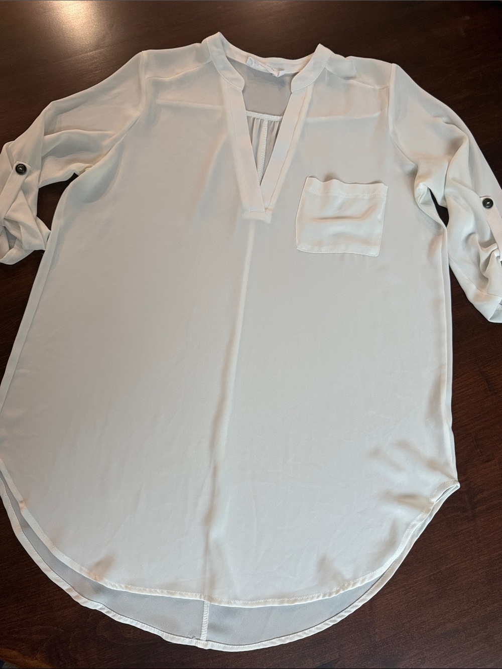 All In Favor white V‑Neck Roll‑Tab Tunic. M. ptp 23” length 33” back 30” front